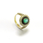 imagem do produto  Anel Esmeralda Oval com Resina Preta e Halo de Diamantes